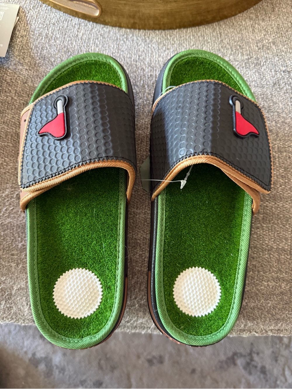 Green Turf Slide Sandals with Black Strap and Red Accent